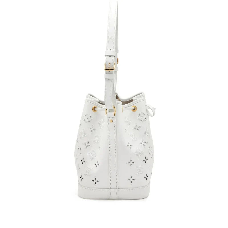 LOUIS VUITTON WHITE CUT-OUT MONOGRAM CALFSKIN PETIT NOÉ GOLD HARDWARE