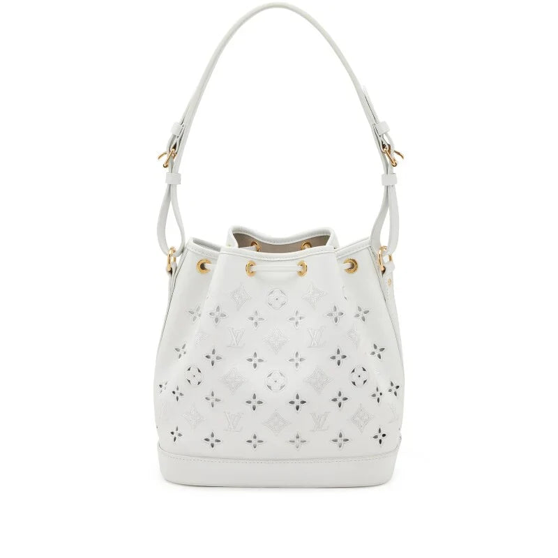 LOUIS VUITTON WHITE CUT-OUT MONOGRAM CALFSKIN PETIT NOÉ GOLD HARDWARE