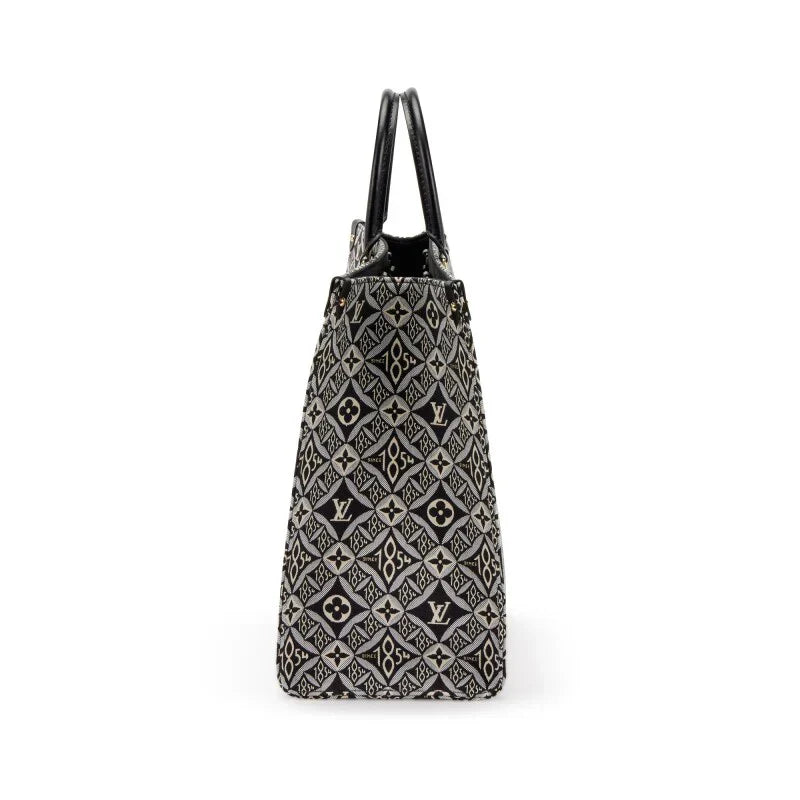 LOUIS VUITTON BLACK AND GREY MONOGRAM JACQUARD SINCE 1854 ONTHEGO GM GOLD HARDWARE